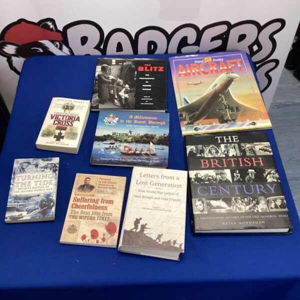 Vintage military history books including WWII and aircraft titles.