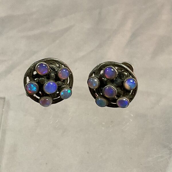 Vintage whitemetal earrings with vibrant opal clusters.