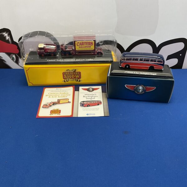 Boxed diecast model trucks from Atlas and The Greatest Show collection.