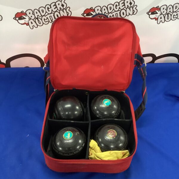 Vintage Almak bowling ball set in a carrying case.
