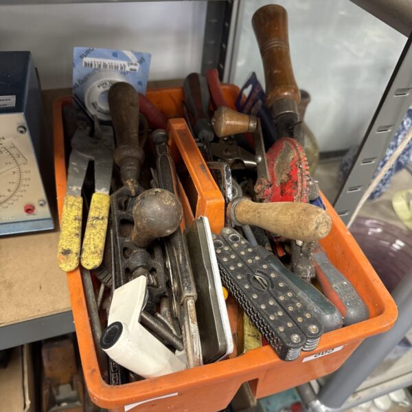 Tray of assorted vintage hand tools for repair and workshop use.