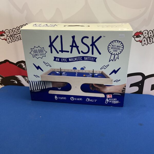 Vintage Klask magnetic game with wooden playing field.