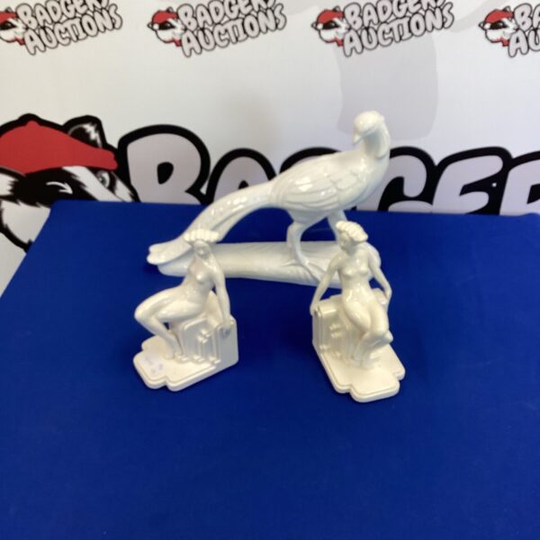 White porcelain figurine from Portugal, vintage collectible.