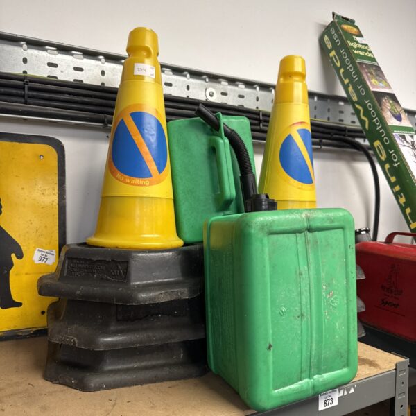 Lot of six orange traffic cones and two plastic jerry cans.
