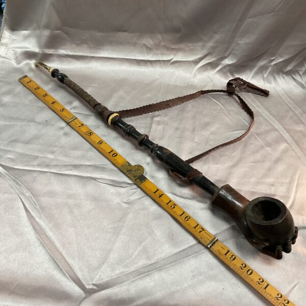 Vintage African long pipe, a unique collectible ethnographic object.