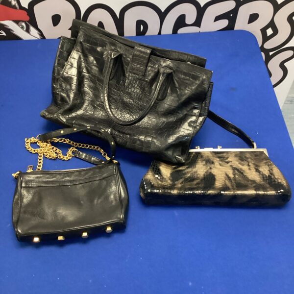 Lot of three vintage black handbags for sale.