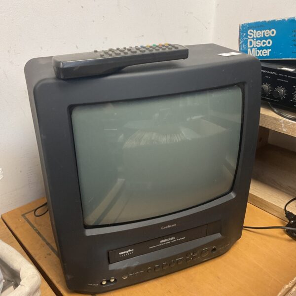 Front view of vintage Goodmans CRT TV with built-in VHS player.