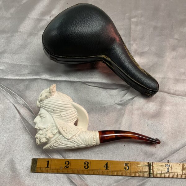Antique meerschaum pipe with Sultan head carving and black case.