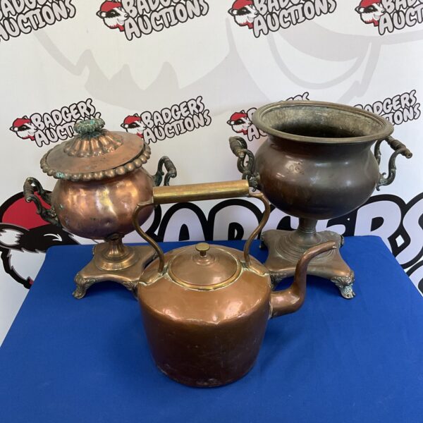 Antique copper samovars and kettle, vintage tea brewing set.