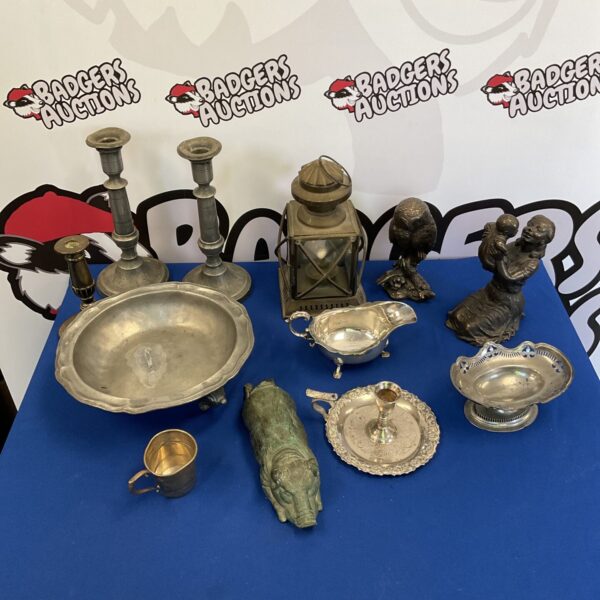 Vintage mixed metalware lot with pewter and brass items.