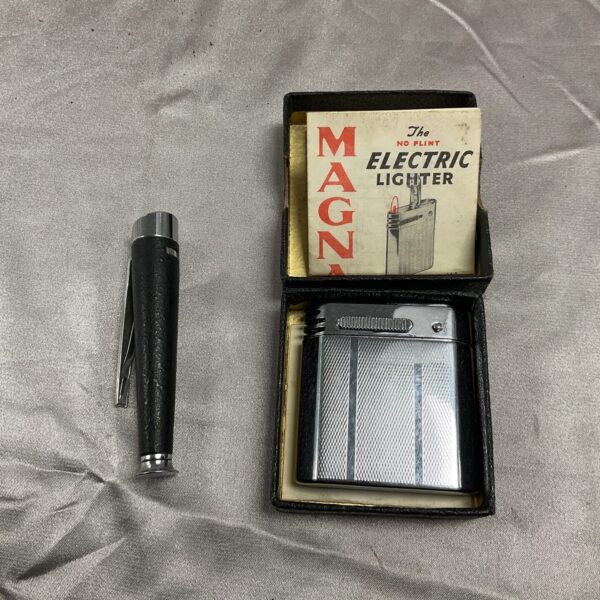 Vintage Magna electric lighter in silver tone.
