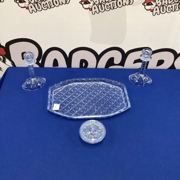 Vintage blue glass dressing table tray with scalloped edge.