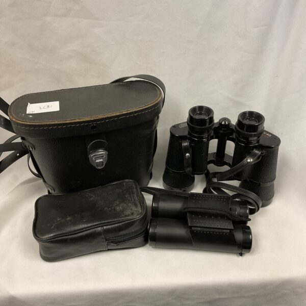 Vintage Harrison Portsmouth 8x40 binoculars in a leather case.