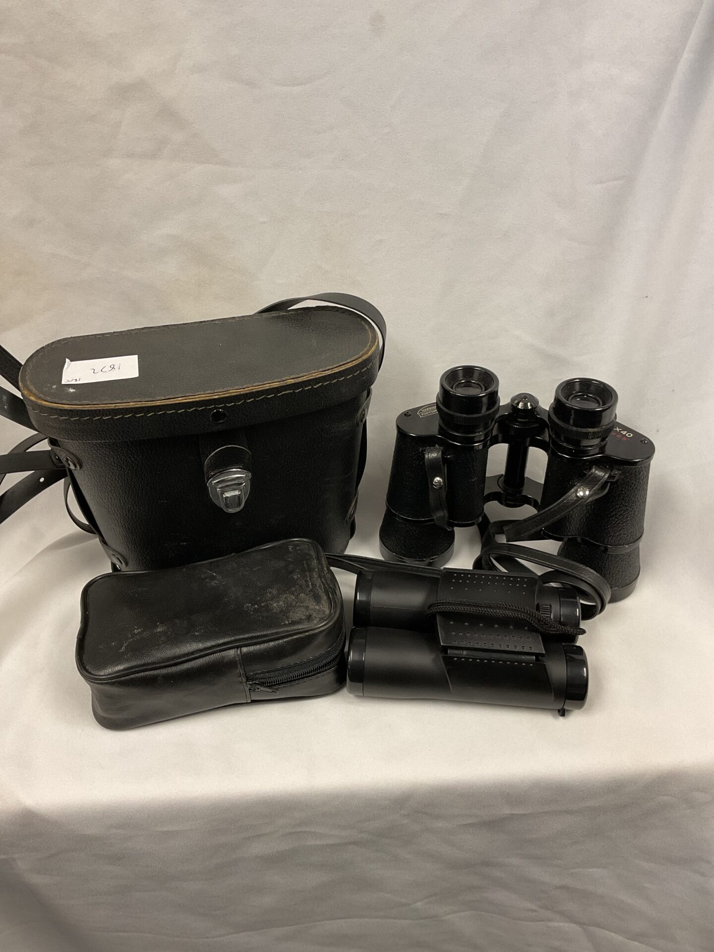 089 Two pairs of binoculars including harrison Portsmouth 8×40