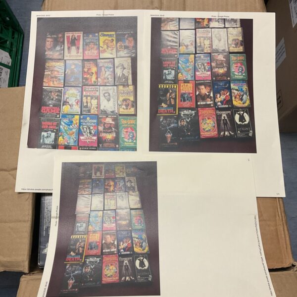 Vintage VHS movie collection lot with various film titles.