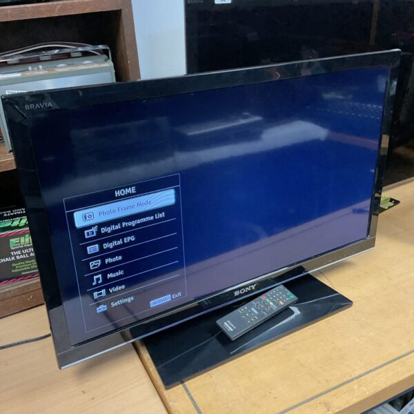 Black Sony Bravia 32 inch LCD television with remote control.