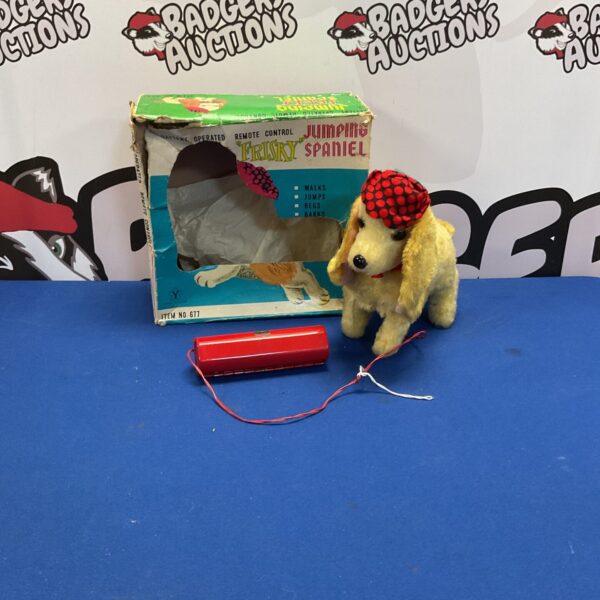 Vintage remote control spaniel toy in original box.