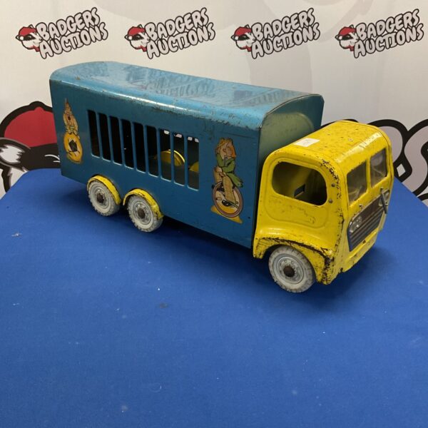 Colourful vintage Triang circus truck, tinplate toy.