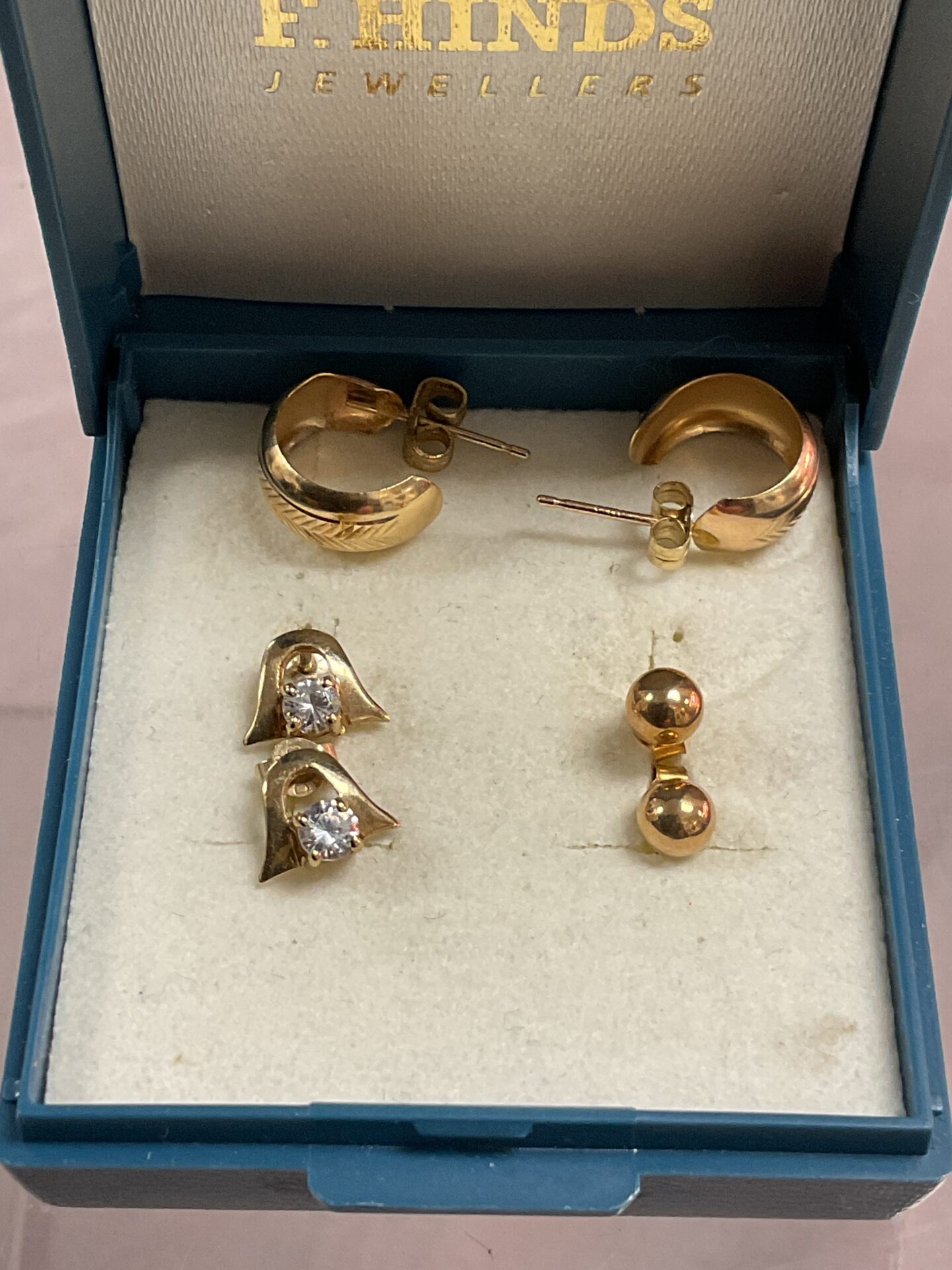 887 Three pairs 9ct gold stud earrings