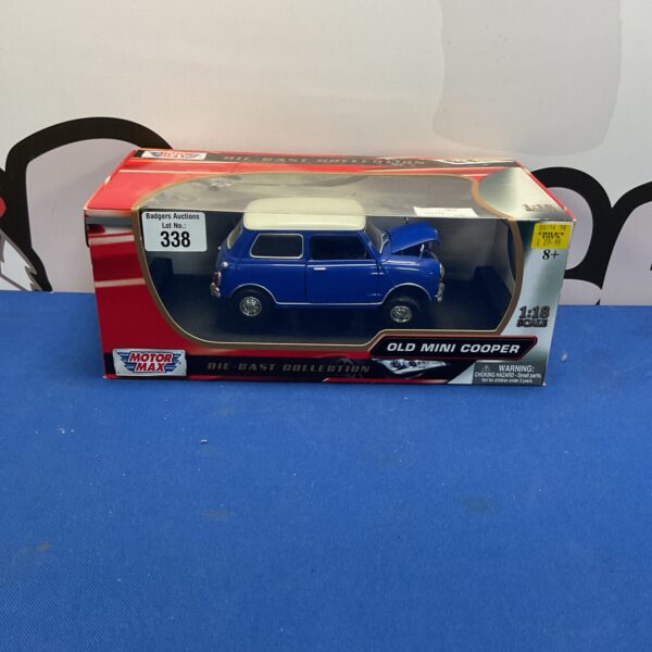 Boxed Motor Max Old Mini Cooper diecast model car.