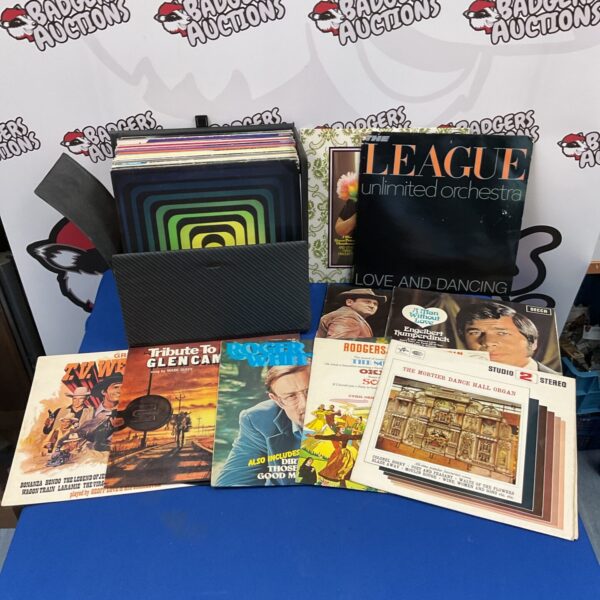 Lot of twelve vintage vinyl records for music collectors.