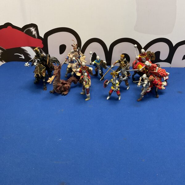 Vintage Papo knights and dragon figures in a collectible lot.