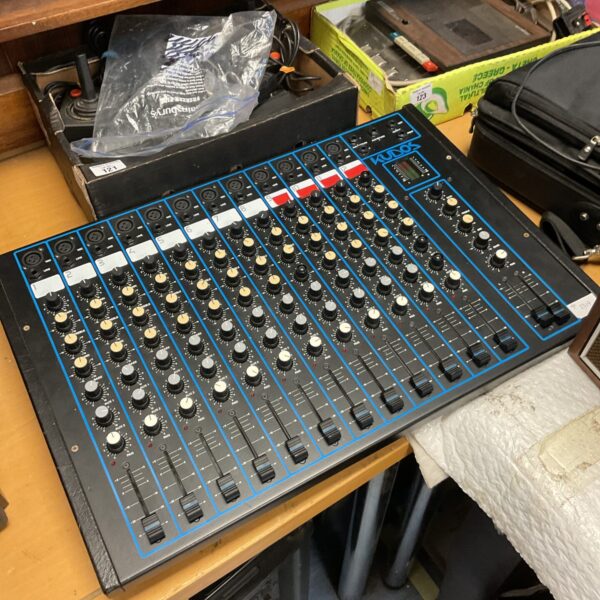 Vintage Kudos 12-channel mixing desk with faders and knobs.