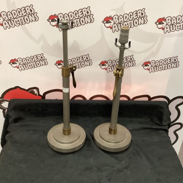 Adjustable ship lamp holder with weighted base.