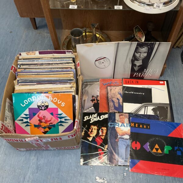 Lot of vintage vinyl records including Freddie Mercury.
