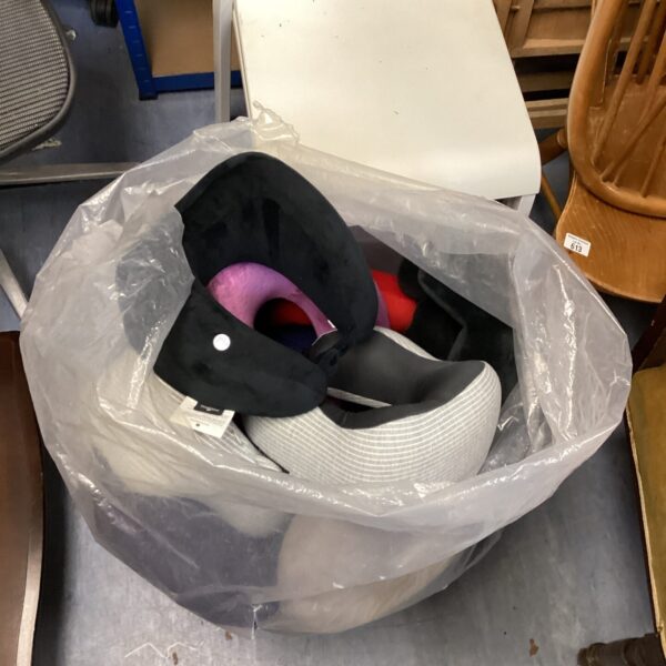 Mixed lot of neck cushions for travel and comfort.