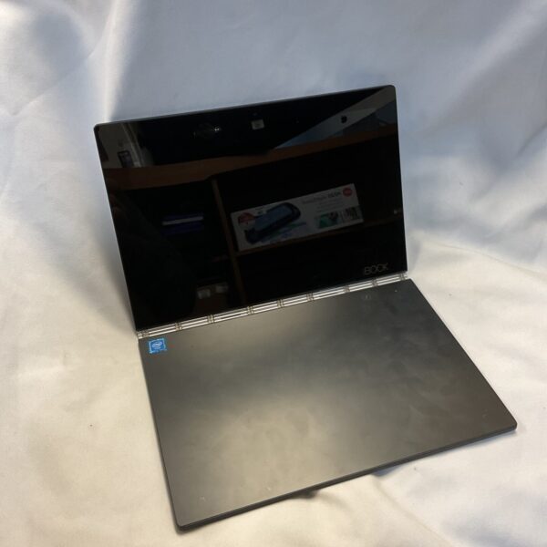 Lenovo Yoga Book YB1-X91F 2-in-1 laptop in silver finish.