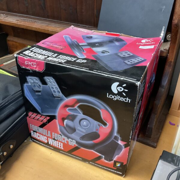 Logitech Formula Force GP racing wheel for PC gaming with force feedback.