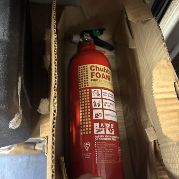 Vintage Chubb foam fire extinguisher in original packaging.