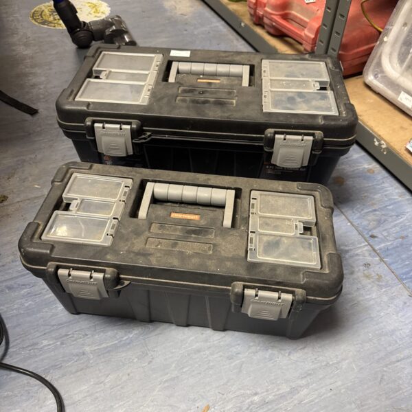Two empty Craft Right toolboxes for tool storage.