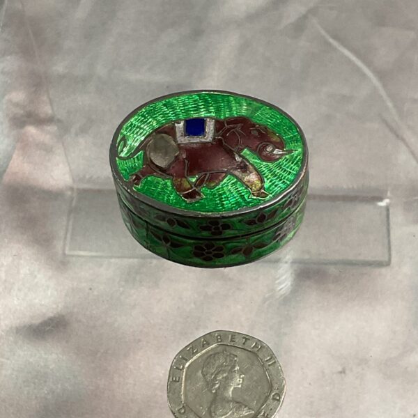 Antique silver enamelled pill pot with bird design.