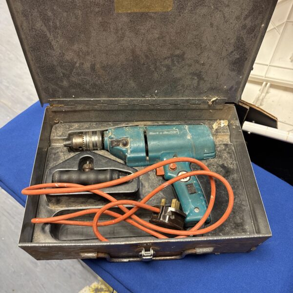 Vintage Black & Decker drill in original carrying case.