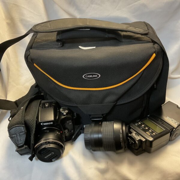 Canon EOS 30 camera kit with flash and lens.