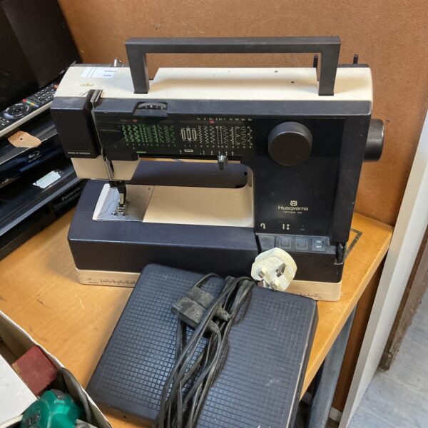 Vintage Husqvarna Optima 190 sewing machine in used condition.