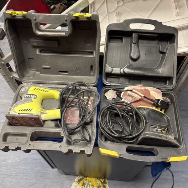 Ryobi nibbler sanders in open carrying case, detail sanders.