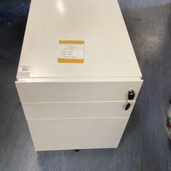 Small metal two-drawer unit on wheels for office storage.