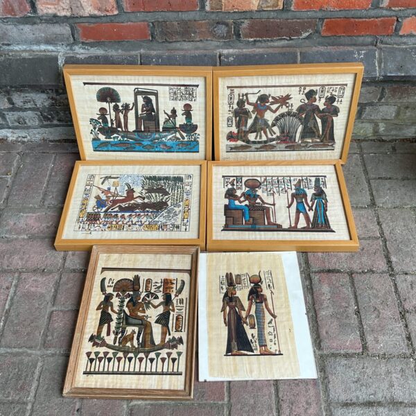 Collection of authentic Egyptian papyrus artworks with hieroglyphic designs.