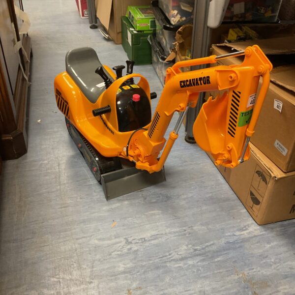 Yellow ride on excavator toy for children's construction play.