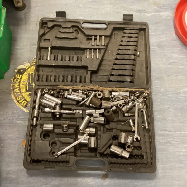 Vintage socket set in a tool case with wrench attachments.