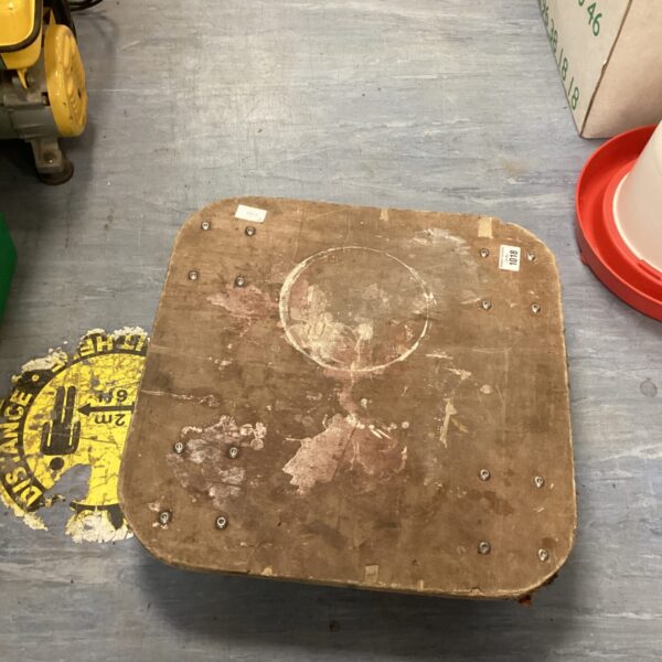 Vintage wooden skate platform with wear and tear.