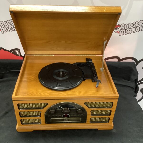 Front view of a vintage Crossley radio gram record player.