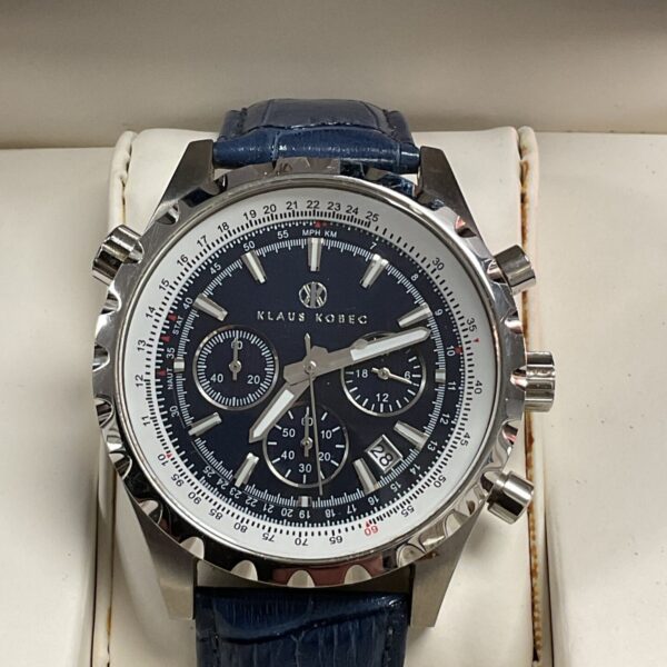 Blue dial Klaus Kobek quartz wristwatch with stainless steel bracelet.