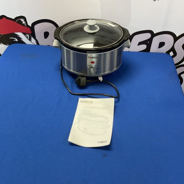 Silver Tower slow cooker with glass lid and control dial.
