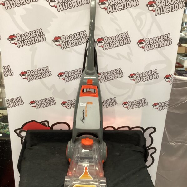 Vintage Vax Rapide upright vacuum cleaner for home cleaning.