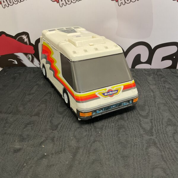 Front view of vintage Micro Machines city van toy.