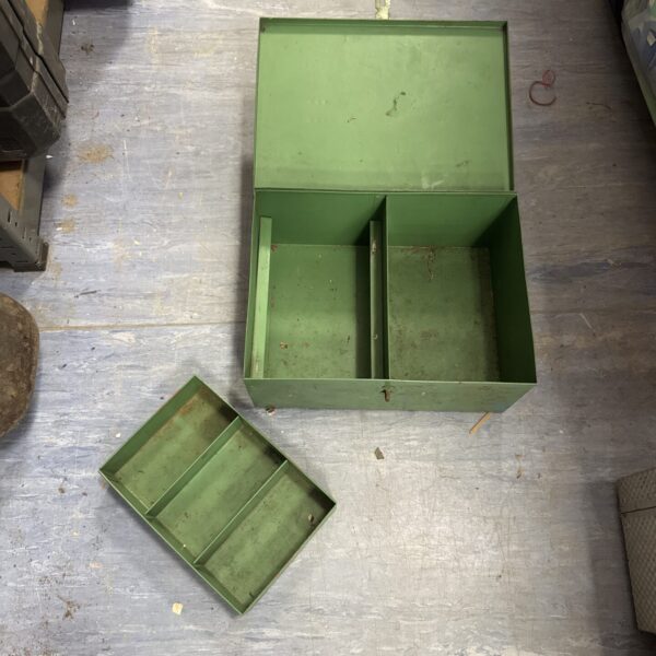 Vintage metal toolbox with a hinged lid and divided interior.
